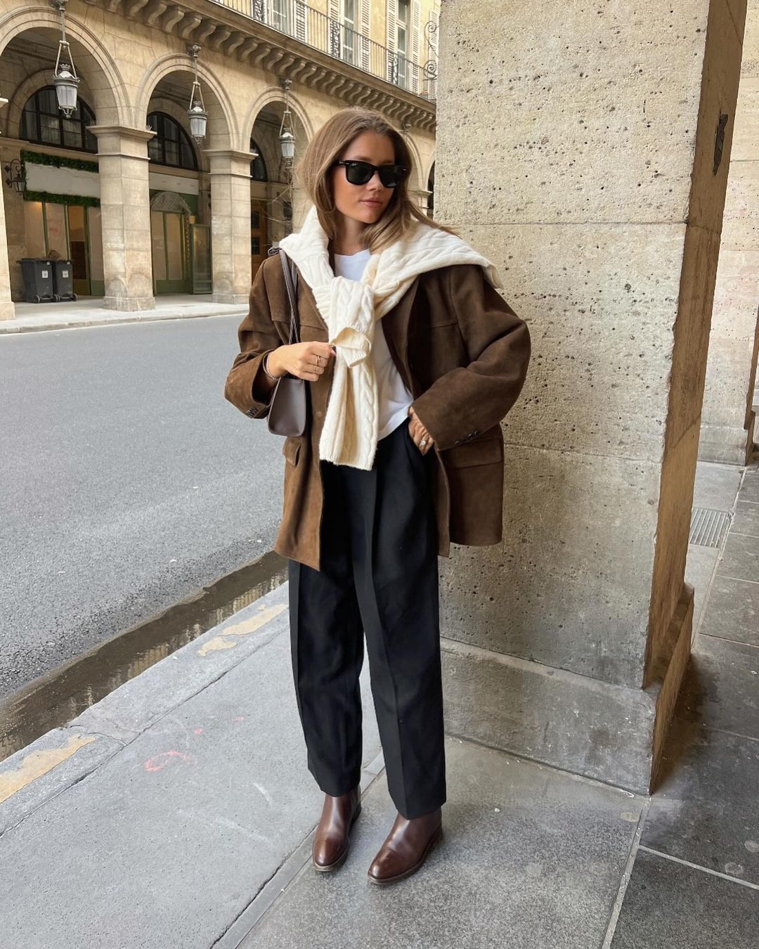 KHAITE Dugan pleated crepe tapered pants Plush